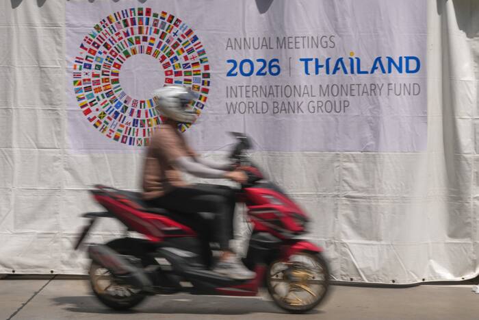 IMF raises its forecast for world growth this year but warns of risks from AI boom and debt