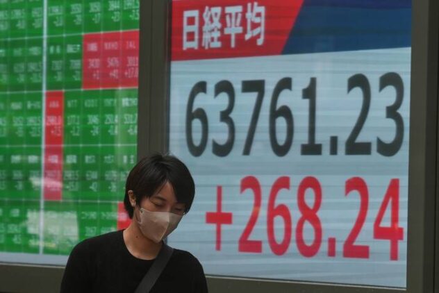 Tokyo shares are higher as easing worries over inflation reduce odds for another Fed rate hike