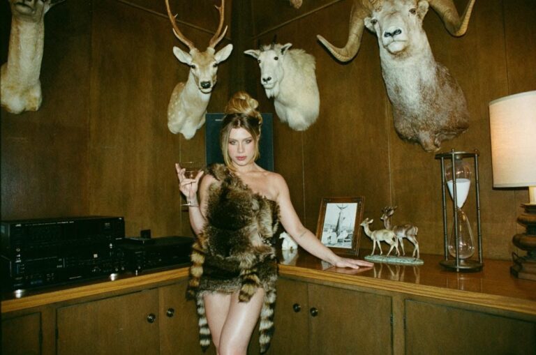Watch Slayyyter Rock a Raccoon Pelt in “I Think He’s Got a Girl” Video